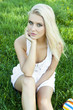 Portrait of the young beautiful smiling woman outdoors