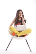 Photo en ligne au meilleur prix Full length of beautiful young girl holding laptop
