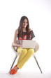 Photo en ligne au meilleur prix Full length of beautiful young girl holding laptop