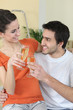 couple clinking glasses during moving