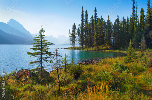 Photo: Nature landscape with mountain lake at dawn in Alberta, Canada Nature landscape with mountain lake at dawn in Alberta, Canada