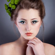 The beauty of the flower girl on a gray background, chrysanthemu The beauty of the flower girl on a gray background, chrysanthemu