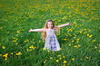 girl on dandelion meadow