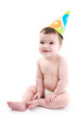 Happy baby wearing party hat