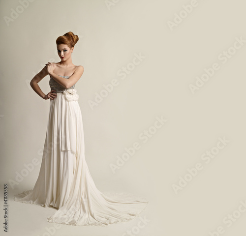 Photo: Portrait of the young girl in a white dress Portrait of the young girl in a white dress