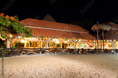 Photo: Mexican hacienda at night with horse paddock Mexican hacienda at night with horse paddock