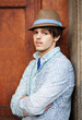 portrait of a handsome young man in a hat portrait of a handsome young man in a hat