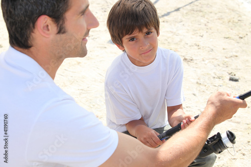 Photo: Father and son fishing Father and son fishing