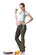Young pregnant woman with scales.. Young pregnant woman with scales..