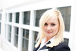 Pretty blonde businesswoman with paperwork