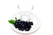 Fresh picked Blueberries and empty glass