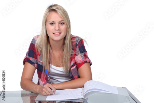 Photo: Teenager doing homework Teenager doing homework