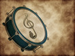 A drum with a treble clef on the old texture A drum with a treble clef on the old texture