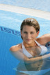 Hot blond woman in pool