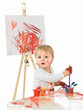pretty baby girl painting in white studio