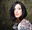 Portrait of young beautiful woman with short dark hair