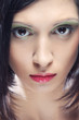 Portrait of young beautiful woman with short dark hair