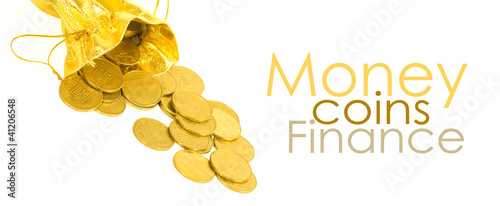 Photo: Money coins in golden bag isolated on white Money coins in golden bag isolated on white