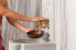 Wellness - woman is doing cold bursts and hydrotherapy