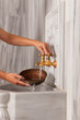 Wellness - woman is doing cold bursts and hydrotherapy
