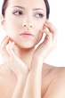 closeup woman portrait with two hands near face
