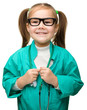 Cute little girl is playing doctor