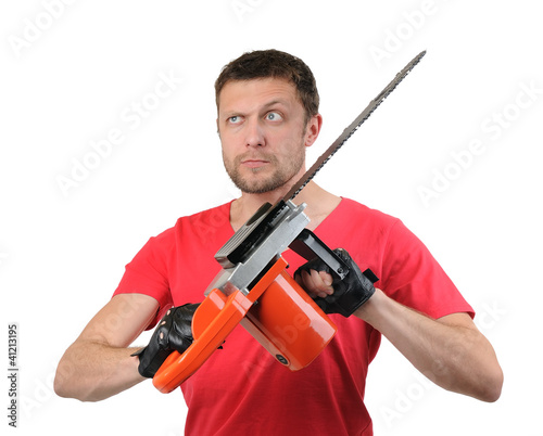 Foto: Portrait man with electric saw on white background Portrait man with electric saw on white background