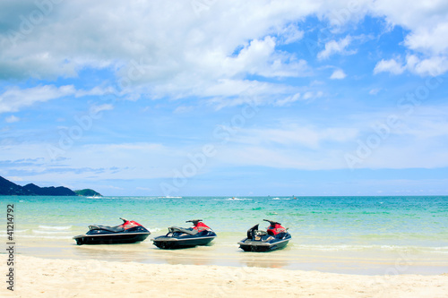Photo: three jetski on the beach. Koh Samui,Thailand three jetski on the beach. Koh Samui,Thailand