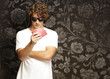 portrait of young man wearing sunglasses and playing poker again portrait of young man wearing sunglasses and playing poker again