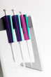Three pipettes on a stand