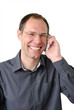 Portrait of a handsome business man speaking over phone