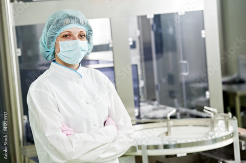 Photo: pharmaceutical factory worker pharmaceutical factory worker
