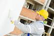 builder facade painter at work builder facade painter at work