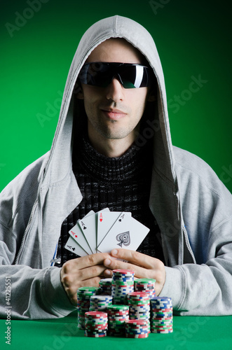 Photo: Man playing in the casino Man playing in the casino