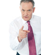 Portrait of an angry middle aged businessman