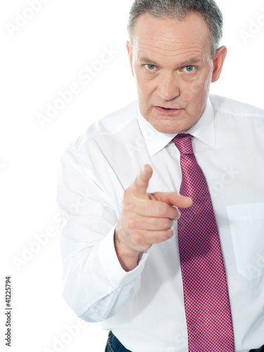 Photo: Portrait of an angry middle aged businessman Portrait of an angry middle aged businessman