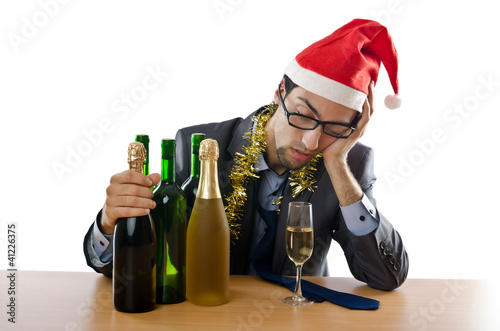 Photo: Drunken businessman after office christmas party Drunken businessman after office christmas party