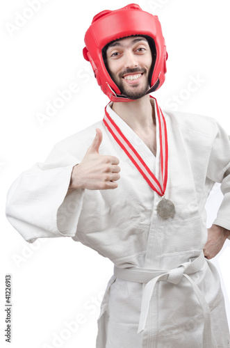 Photo: Karate fighter isolated on the white Karate fighter isolated on the white