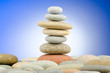 Pebbles stack against gradient background Pebbles stack against gradient background