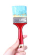 brush with blue paint on white brush with blue paint on white