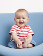 happy toddler seated down
