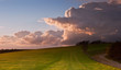 Stunning landscape with stormy sky over rural hills