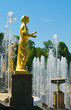 Old statue on fountains background. St.Petersburg, Petrodvorets. Old statue on fountains background. St.Petersburg, Petrodvorets.