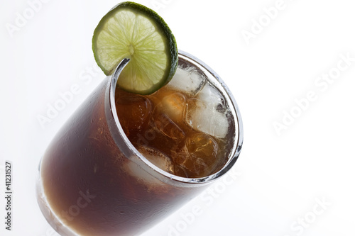 Photo: Cuba Libre Cocktail isolated on white background Cuba Libre Cocktail isolated on white background