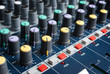 sound mixer console with highlighted button, pump the volume