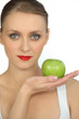graceful ballerina with bright red lipstick holding green apple