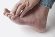 man with itchy toes