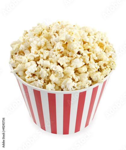 Photo: Popcorn in red and white cardboard box for cinema Popcorn in red and white cardboard box for cinema