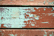 The old planks with peeling multicolor paint The old planks with peeling multicolor paint