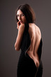 woman in a black dress